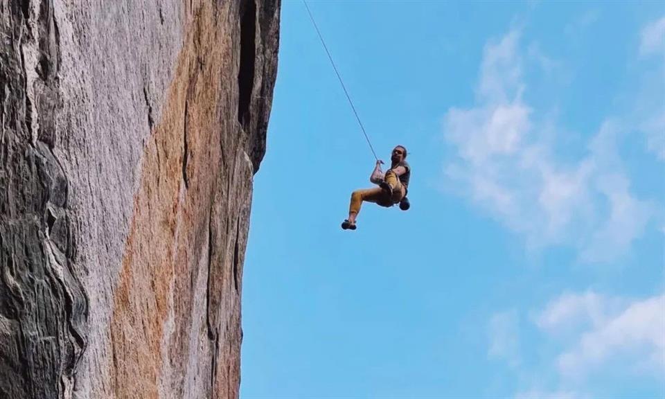 Jochem climbing in the mountains.